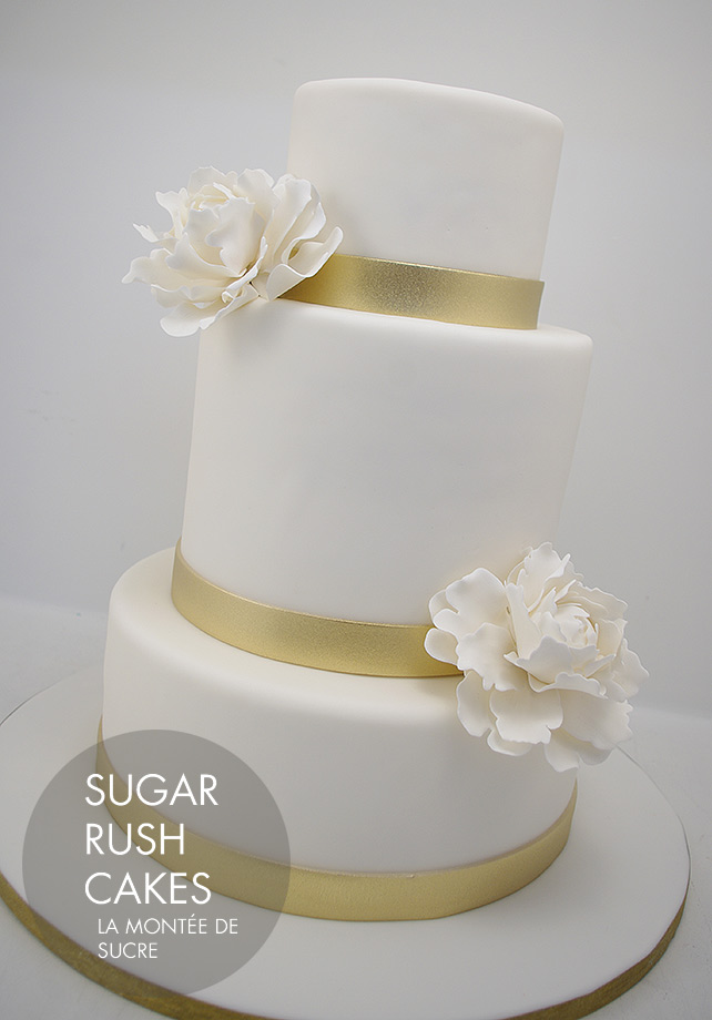 White and gold wedding cake